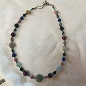 Beautiful semi precious stones in a long choker strand